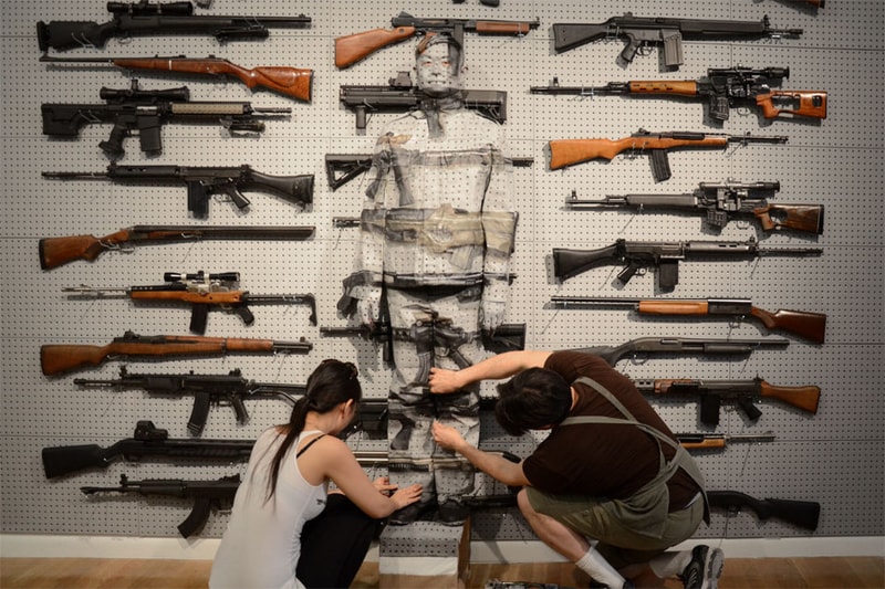 Liu Bolin's Gun Rack Performance @ Eli Klein Fine Art Gallery New York