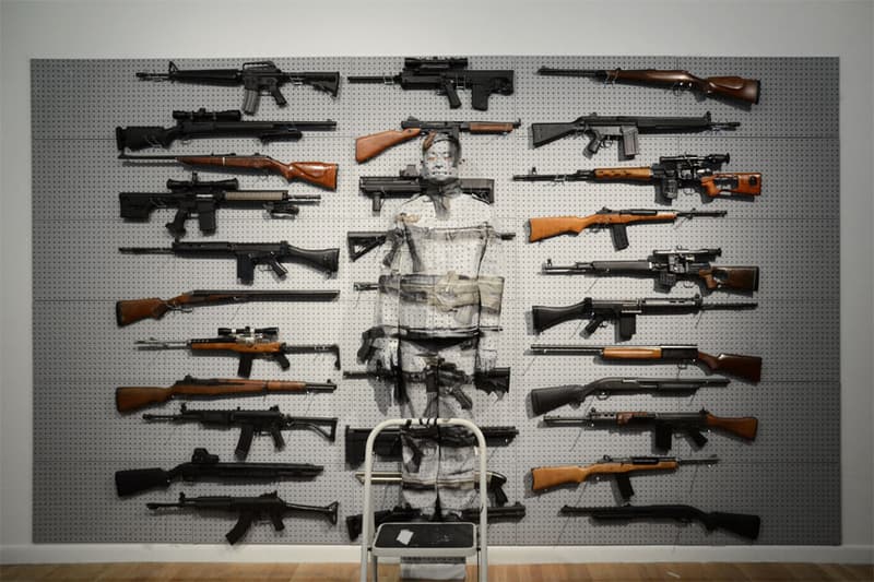 Liu Bolin's Gun Rack Performance @ Eli Klein Fine Art Gallery New York