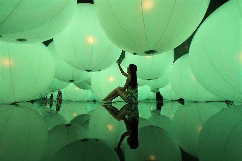 teamLab's Illuminated Spheres Respond to Human Touch