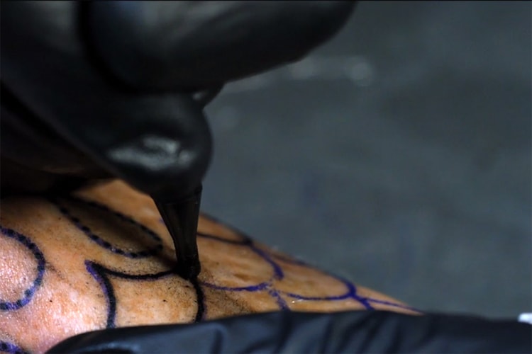 A Mesmerizing Video of a Tattoo Gun in Slow Motion