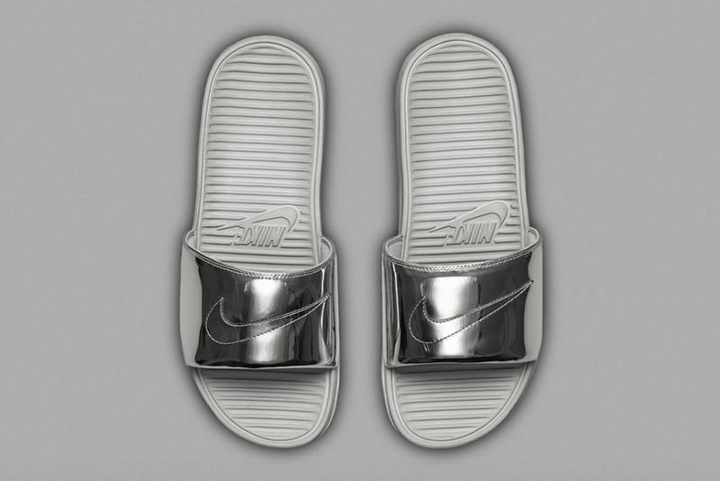 silver nike sliders