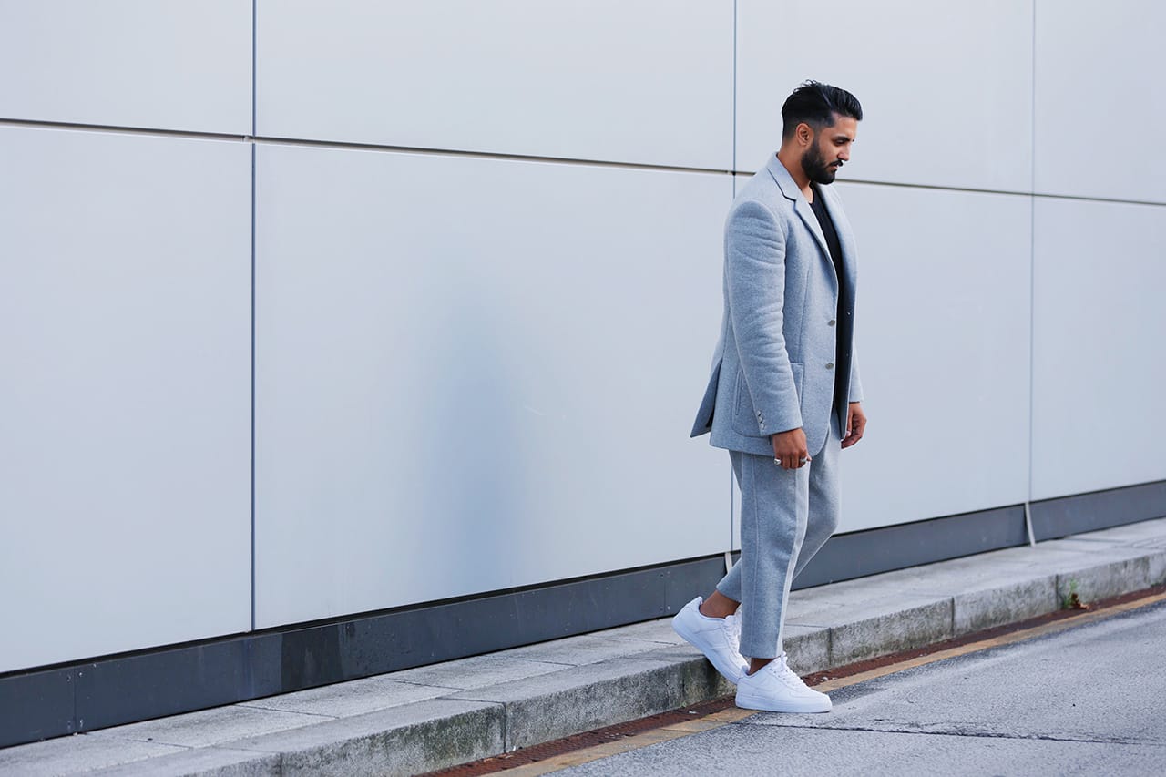 suit and nike sneakers