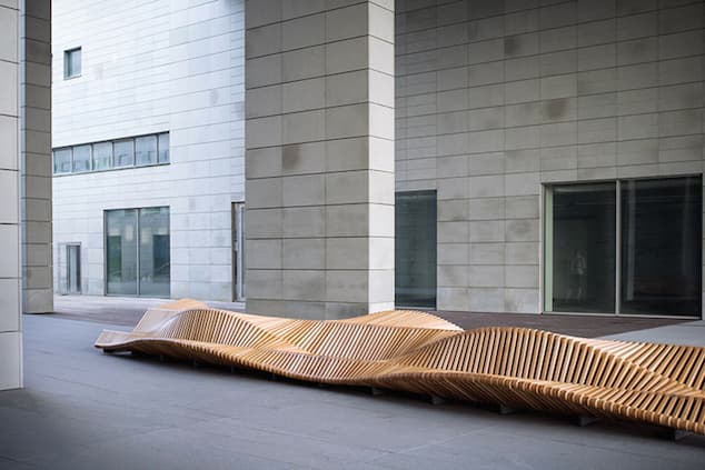 Long Wooden Bench by Piotr Zuraw