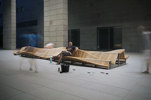 Long Wooden Bench by Piotr Zuraw