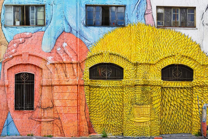 BLU Animates Wall Structures into Faces for his Mural in Rome