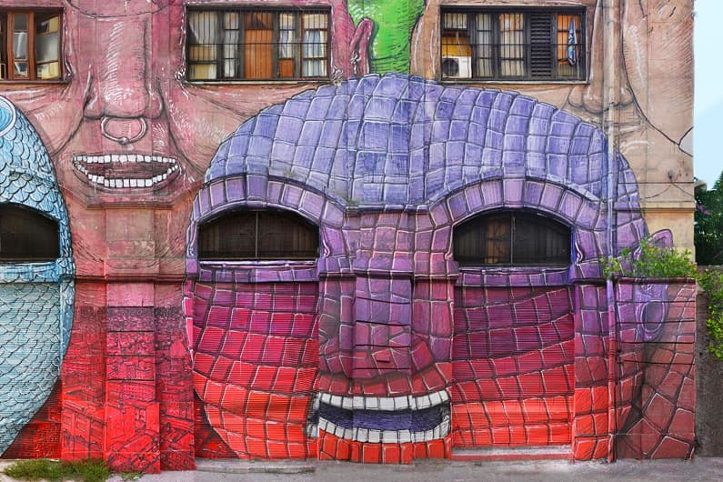 BLU Animates Wall Structures into Faces for his Mural in Rome