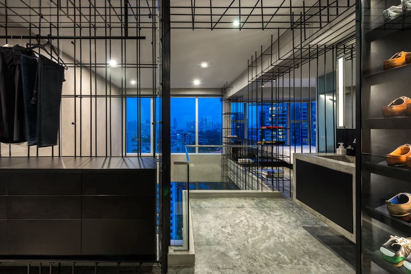 A Look Inside the Singapore Loft Unified by a Giant Cage