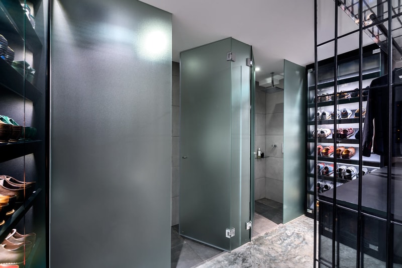 A Look Inside the Singapore Loft Unified by a Giant Cage
