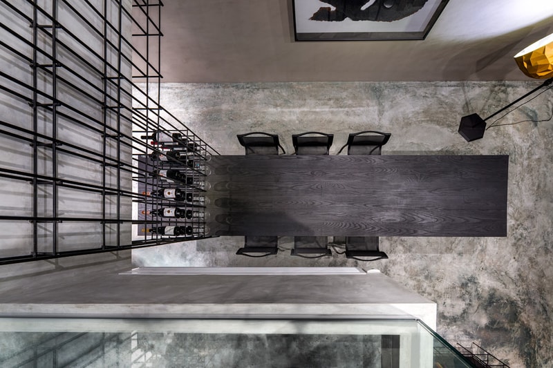 A Look Inside the Singapore Loft Unified by a Giant Cage