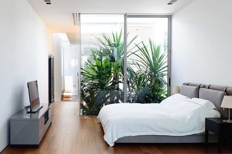 HYLA Architects Designs Three-Story Home Around Spiral Staircase