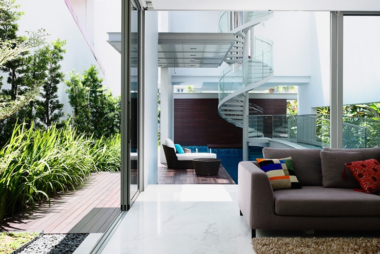 HYLA Architects Designs Three-Story Home Around Spiral Staircase