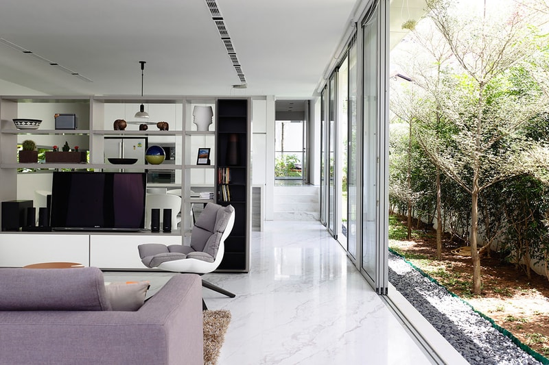 HYLA Architects Designs Three-Story Home Around Spiral Staircase