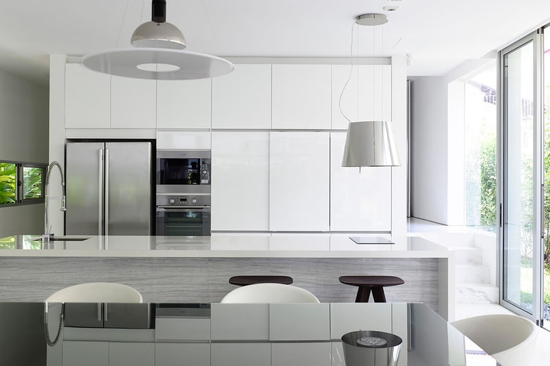 HYLA Architects Designs Three-Story Home Around Spiral Staircase