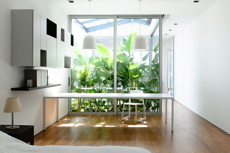 HYLA Architects Designs Three-Story Home Around Spiral Staircase