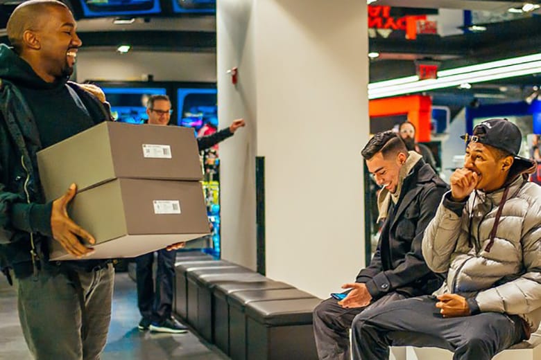 Kanye West Puts On a Smile and Hand Delivers the First Pairs of Yeezy Boost