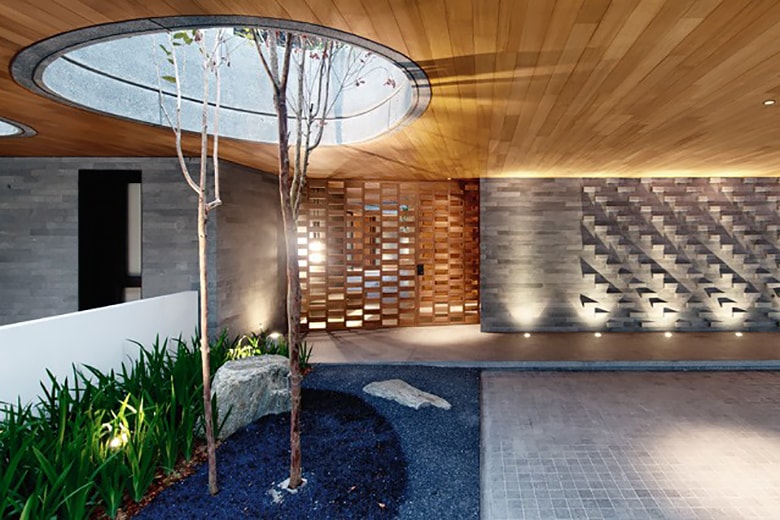 The Wall House by FARM Architects Overlooks Singapore Skyline