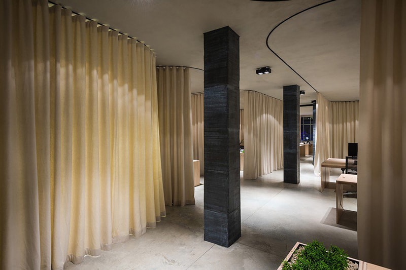Dekleva Gregoric Architects Uses Curtains to Create Rooms in This Office Design