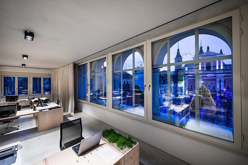 Dekleva Gregoric Architects Uses Curtains to Create Rooms in This Office Design