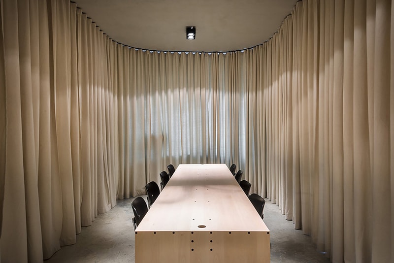 Dekleva Gregoric Architects Uses Curtains to Create Rooms in This Office Design