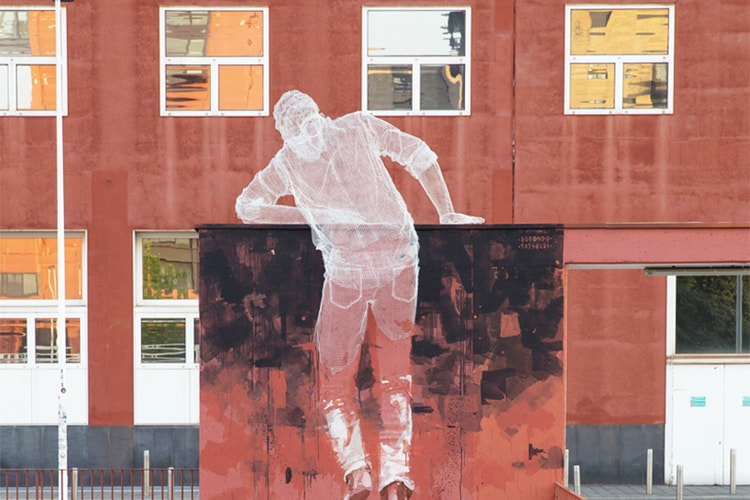 This Mixed Media Sculpture Emerges From the Wall in Università Bicocca in Milan