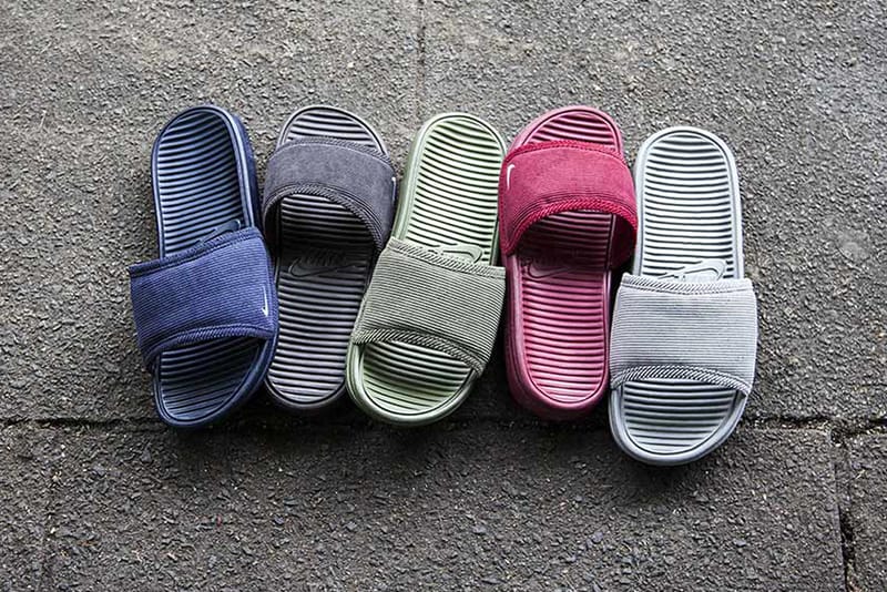 purple nike benassi slides