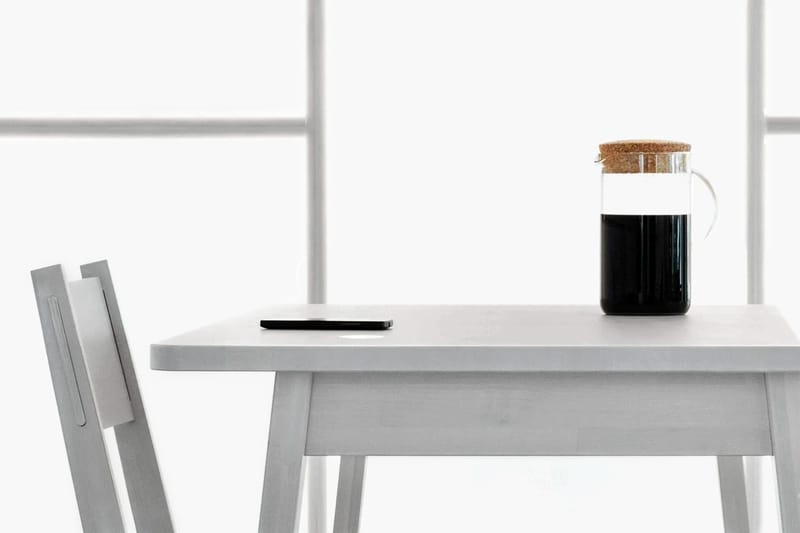 This IKEA Kitchen Table Wirelessly Charges Your Phone Using Heat From a Saucepan