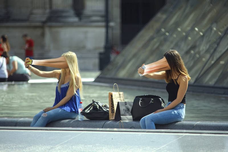 Photographer Portrays Faces Being Absorbed By Smartphones