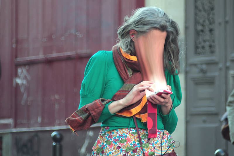 Photographer Portrays Faces Being Absorbed By Smartphones