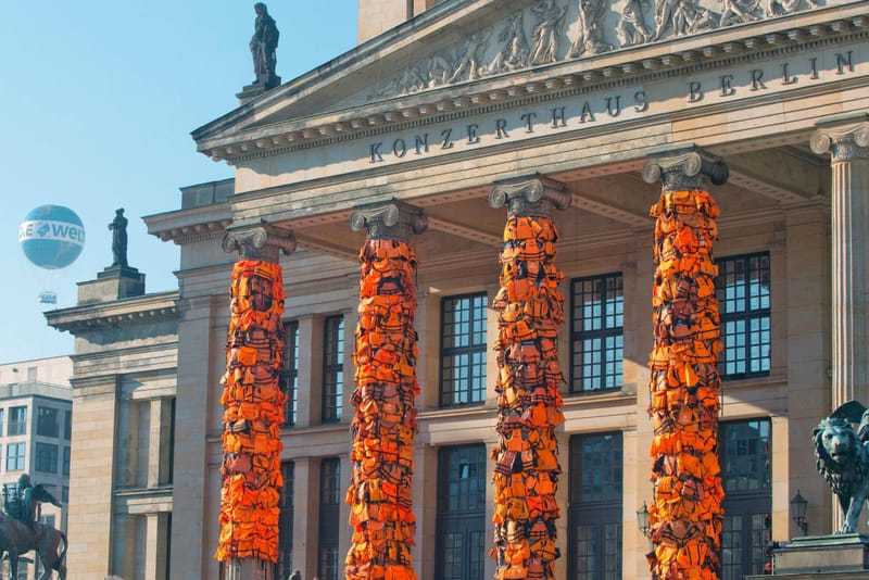 Ai Weiwei Ties 14,000 Refugee Life Jackets Onto Berlin Concert Hall