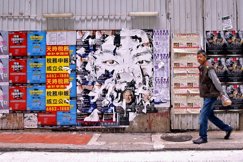 Vhils' "Debris" Scrapes Away the Holistic Surfaces of Urban Societies 