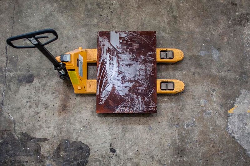 Vhils' "Debris" Scrapes Away the Holistic Surfaces of Urban Societies 