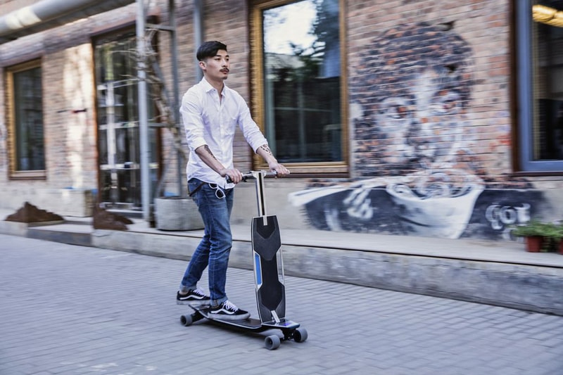 Audi Packed an Electric, Autonomous Longboard Into the Bumper of a Q3 With Its Connected Mobility Concept