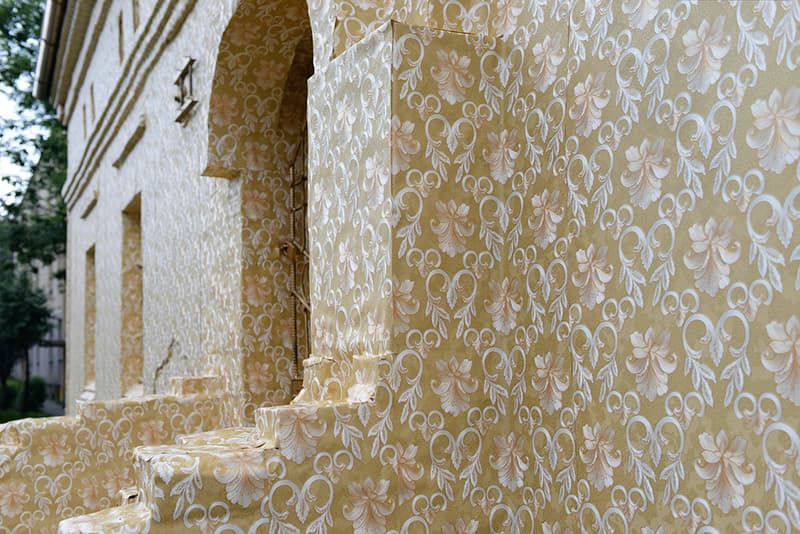 Ian Strange Zloty Exhibition Wraps Gold Wallpaper Around Historic Polish Building