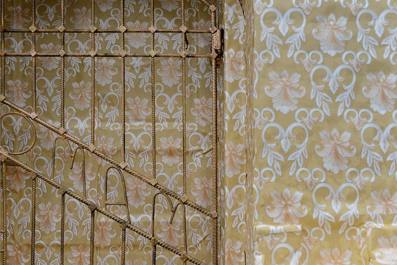 Ian Strange Zloty Exhibition Wraps Gold Wallpaper Around Historic Polish Building