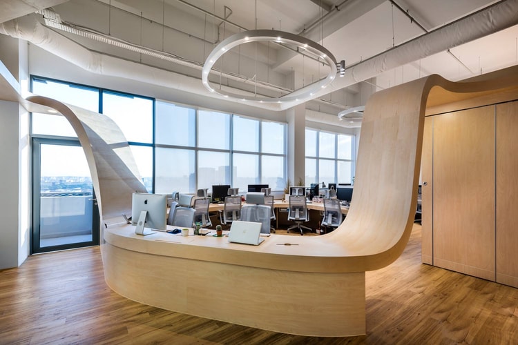 This Workspace Was Built Around a Single Undulating Desk