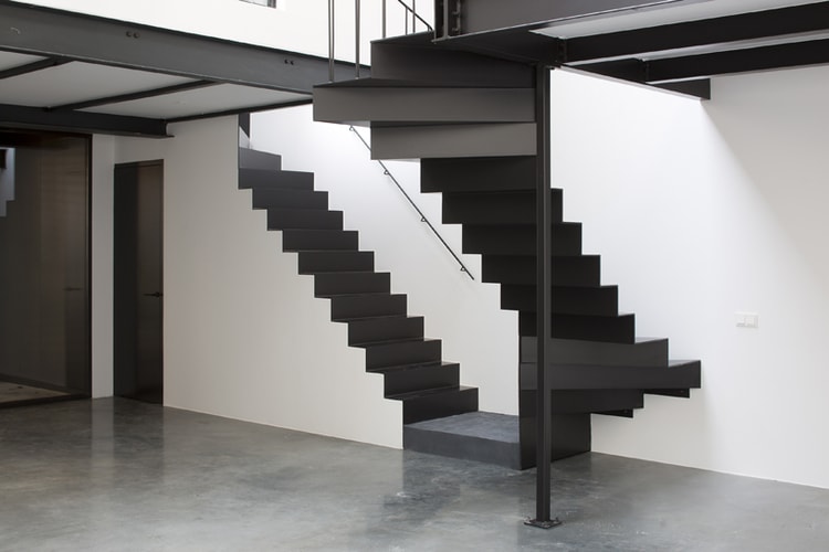 Old Gearwheel Factory Converted Into One of the Simplest Lofts We've Seen So Far