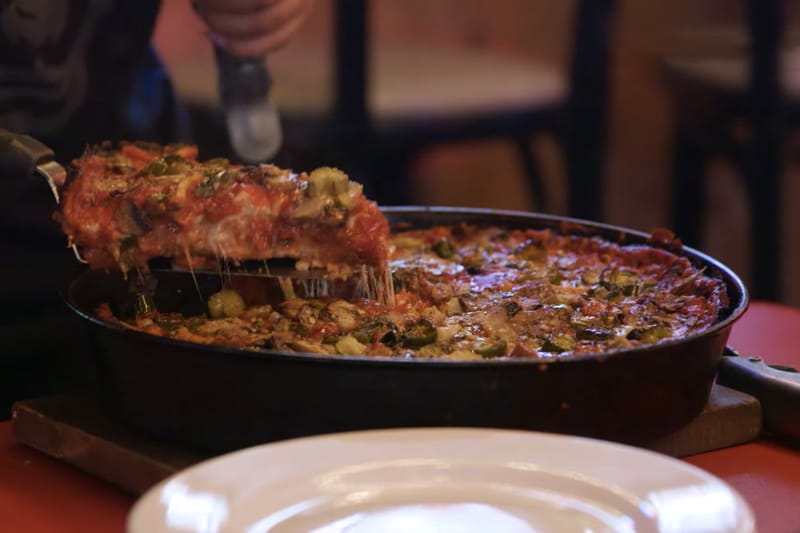 MUNCHIES' 'The Pizza Show' Dives Into Deep Dish & Tavern-Style Thin in Chicago