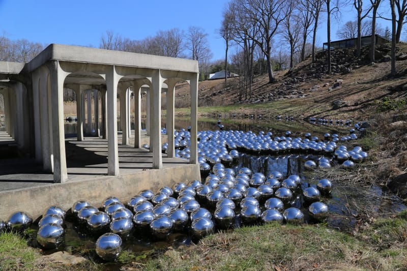 Yayoi Kusama Floats 1,300 Spheres to Create an Ever-Changing Landscape Installation