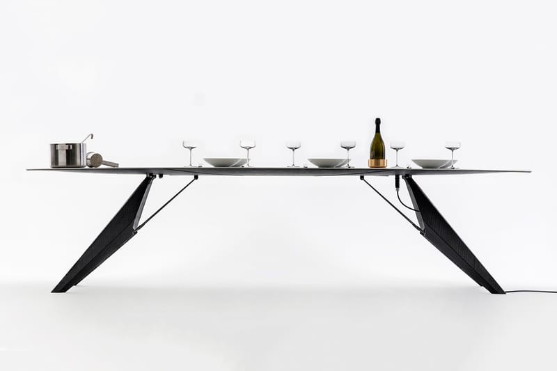 This Smart Dining Table Can Both Charge Your Phone and Boil a Pot of Water