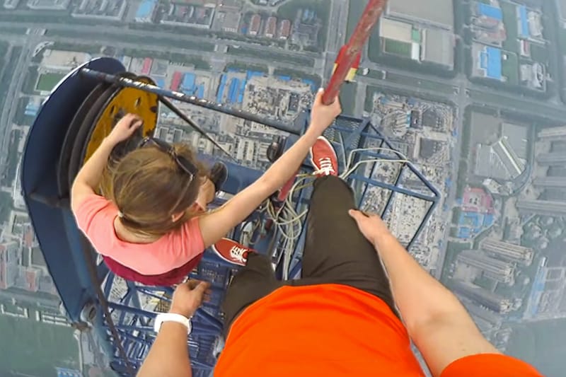 This Fearless Couple Climbs the Highest Construction Site in the World