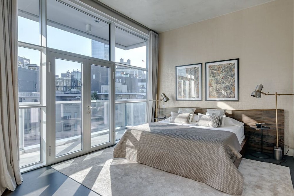 kanye kim kardashian airbnb penthouse triplex marble kitchen balcony