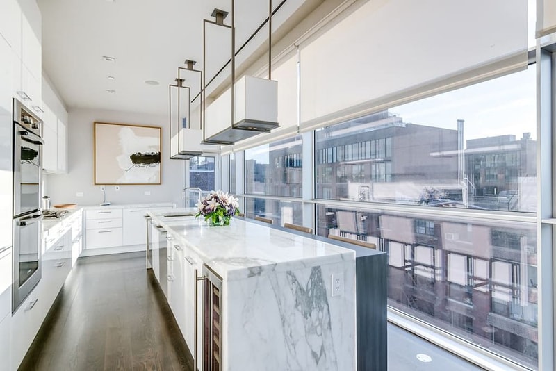 kanye kim kardashian airbnb penthouse triplex marble kitchen balcony