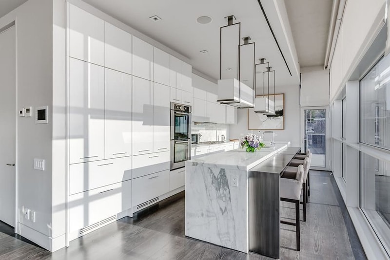kanye kim kardashian airbnb penthouse triplex marble kitchen balcony