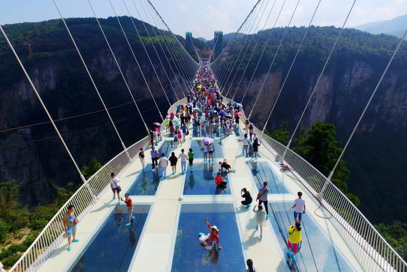 The World's Highest and Longest Glass-Bottom Bridge Is Now Open in China