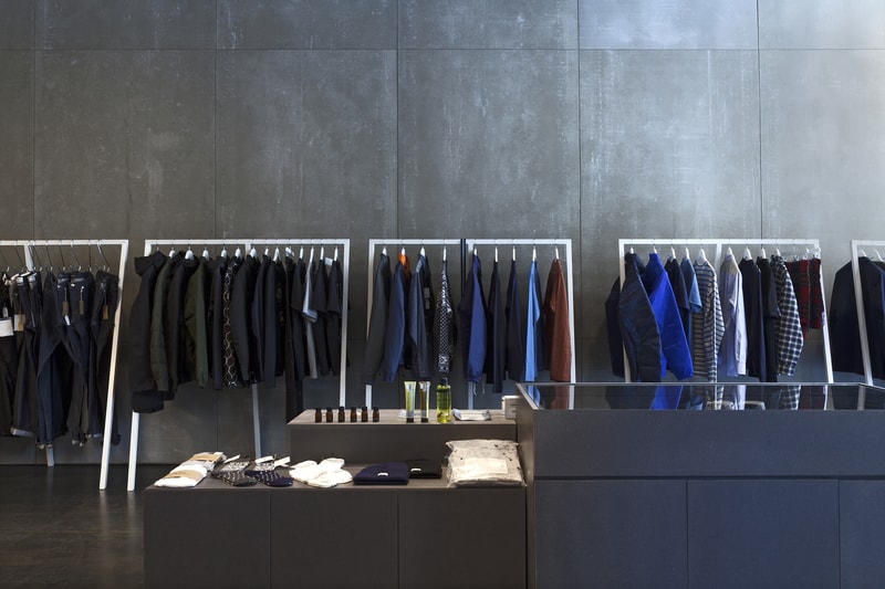 SUMMER Store Lyon Interior concrete wood rack