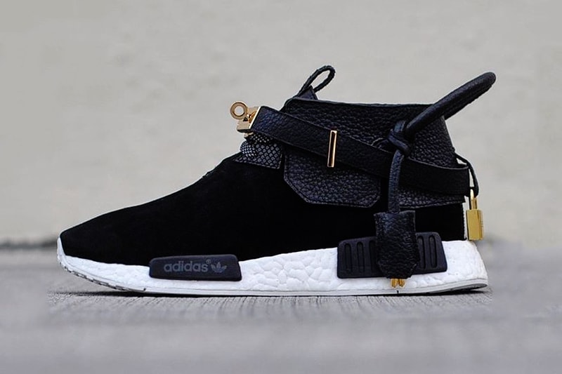 The Remade Creates a Pair of Hermès x adidas NMD originals french luxury house custom made black gold lock