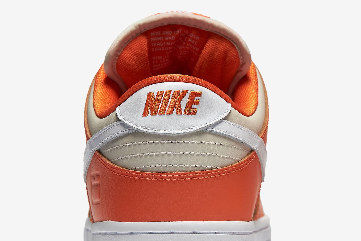 Nike SB Dunk Low Premium Orange Box Closer Look Old School Orange white colorway skateboarding white swoosh shoebox emboss