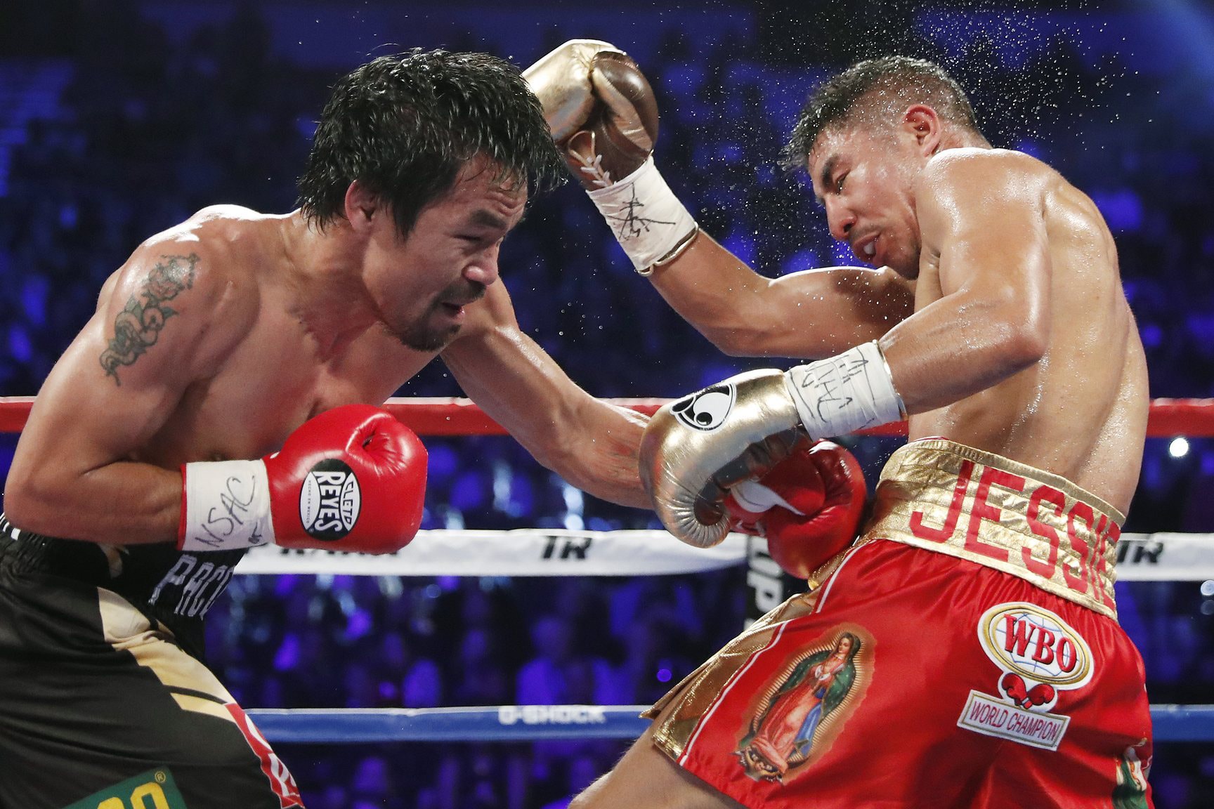 Manny Pacquiao Defeats Jessie Vargas In front of Floyd Mayweather WBO welterweight title