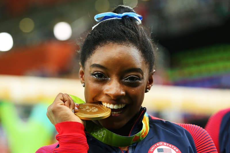 Simone Biles 2016 rio olympics gold medal bit bitting teeth win games gymnastics gymnast