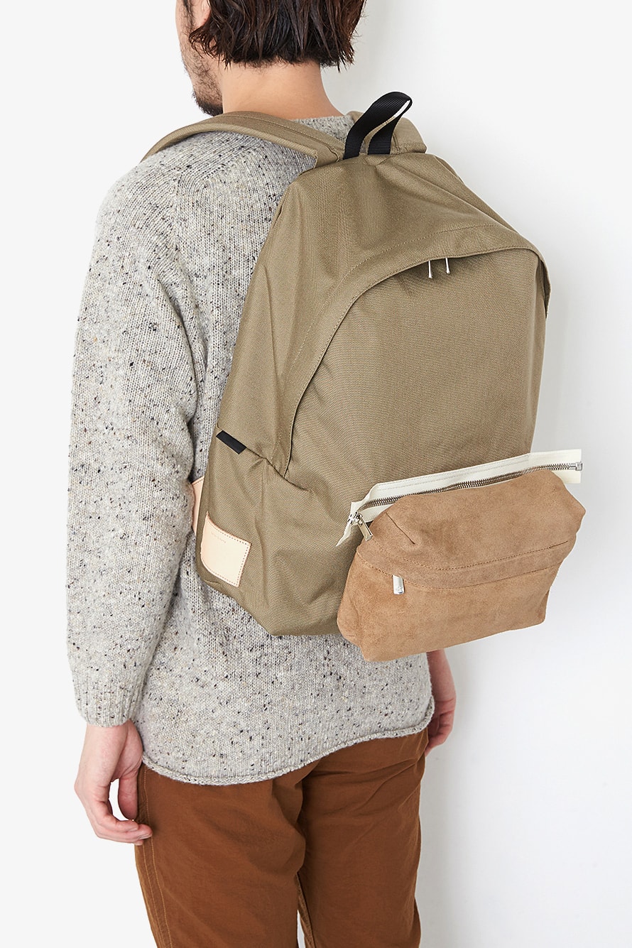 Hender Scheme CORDURA Backpacks With Zip-Off Pouches in Black and Beige